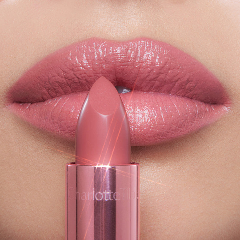 Model wearing Icon Baby lip liner and lipstick combination