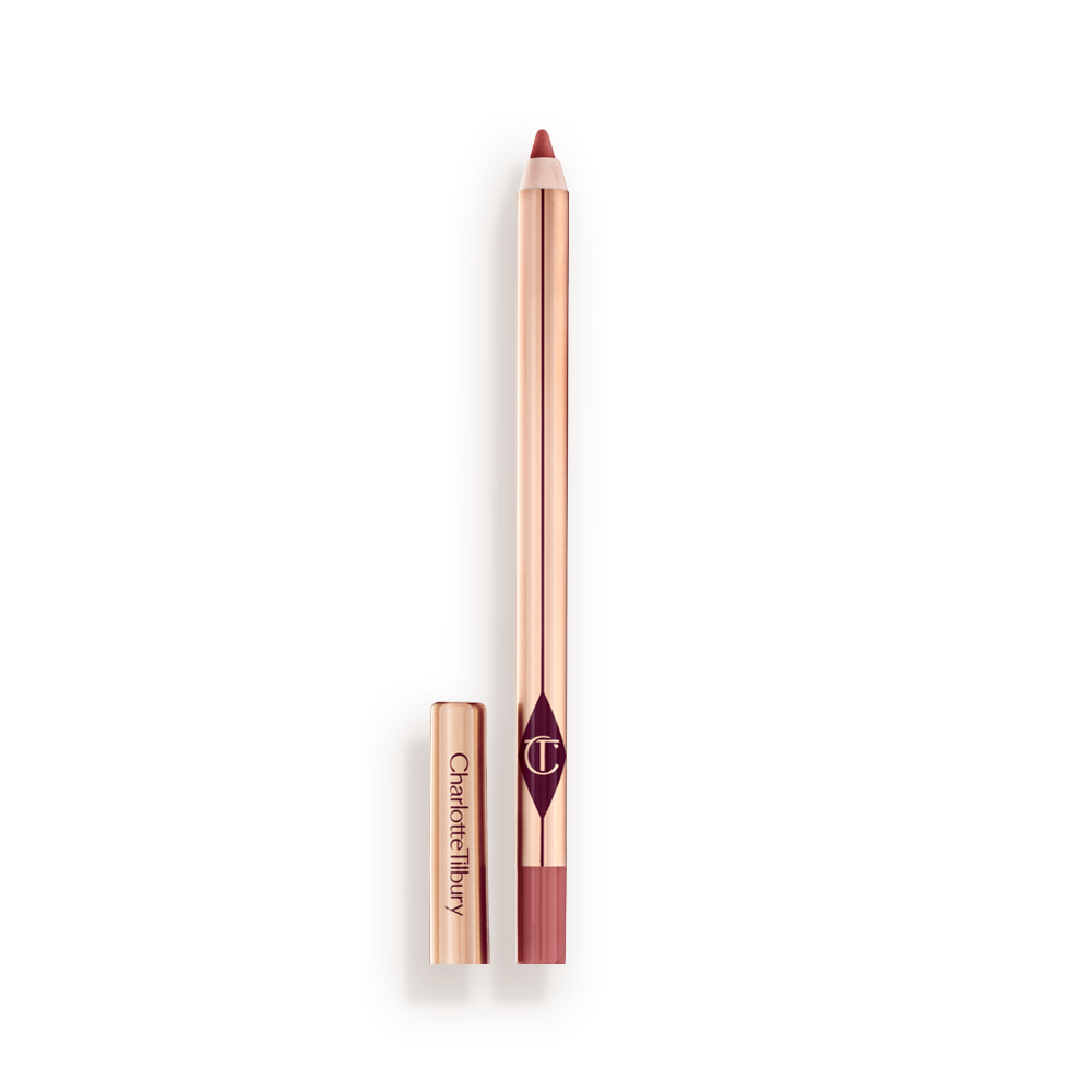 A standard-sized, nude-pink lip liner pencil with its lid removed, with a reflective, golden-coloured exterior. 