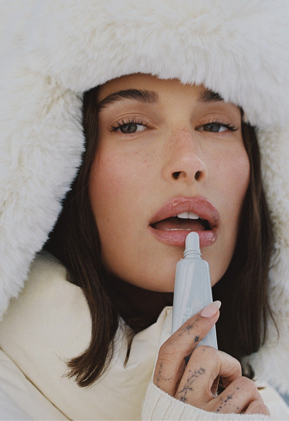 rhode official product gallery — lip boost unscented hero1 mobile.jpg