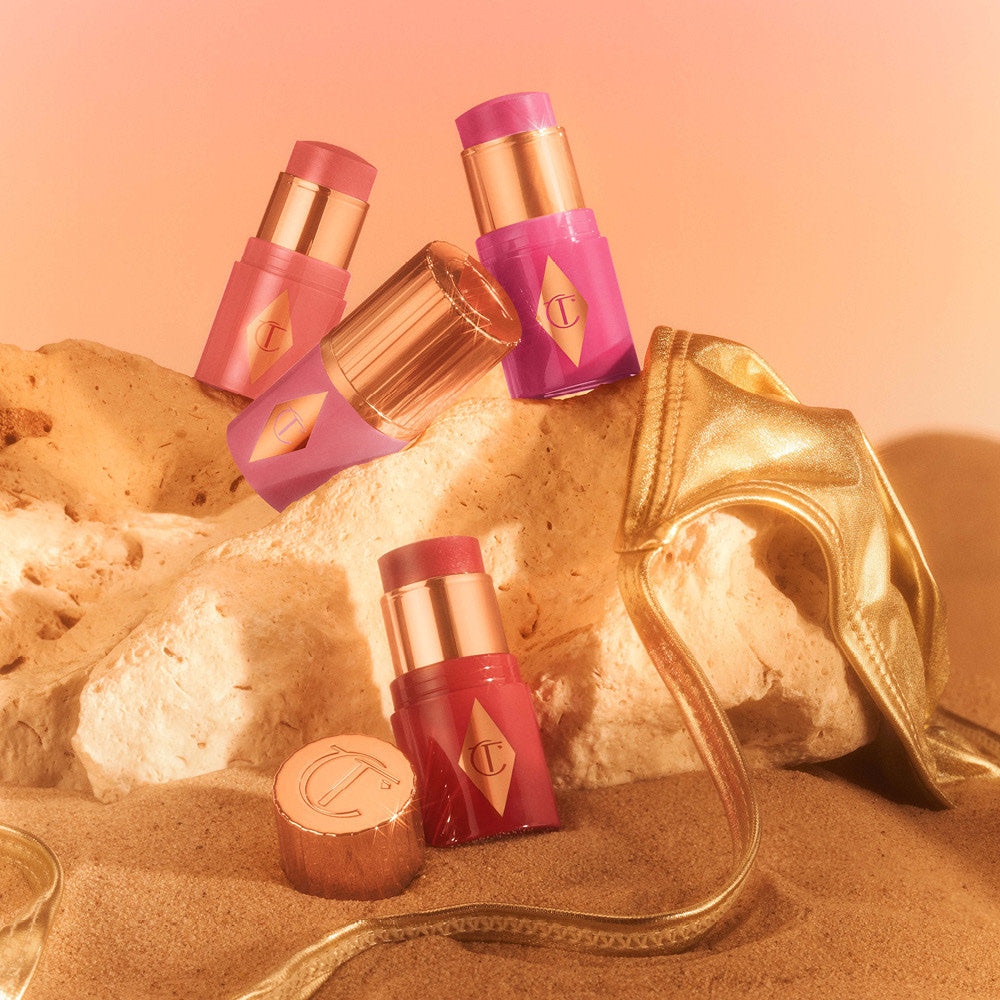 Charlotte Tilbury Mini Unreal Lip + Cheek Glow Blush Stick with Hyaluronic Acid - Cherry Glow - official image 7